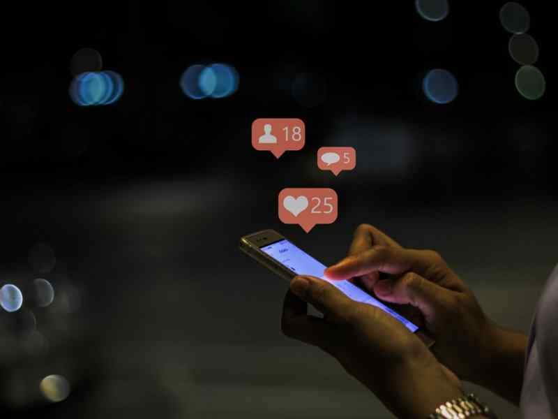 Image 10 A Person Using Smart Phone Checking The Notifications